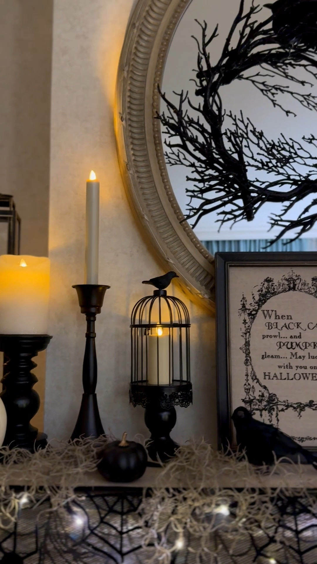 Halloween living room mantel decor, Halloween home decor, black skull candles, decorative crows, Luminara candles