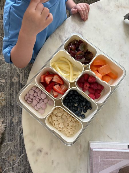 Kids snackle box off of Amazon!! Such a great size for toddlers. His snack spinner that we have and loved just wasn’t big enough anymore and this one’s perfect for his snacks now! 

Amazon find, toddler favorites, snackle box, snack box, picnic, toddler snacks, toddler summer faves, toddler hacks 

#LTKfindsunder50 #LTKkids #LTKfamily