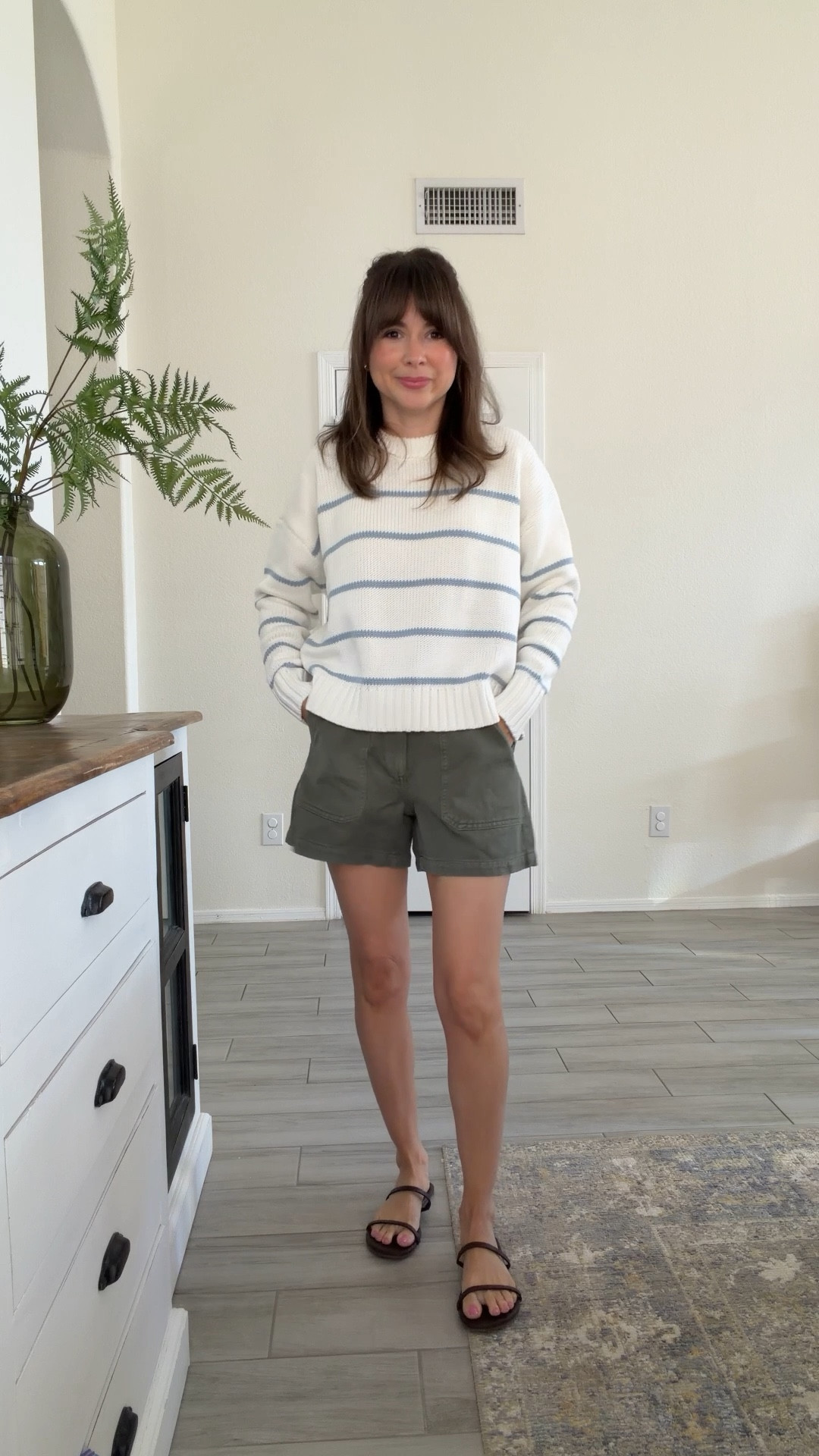 Easy, everyday outfit that actually works for 5’2.

Lightweight striped sweater (not bulky, not overwhelming on a petite frame) + mid-thigh utility shorts that don’t swallow your legs. The proportions are what make this work.

I love this for transitional weather, school pickup, errands, or casual dinner.

@Quince 

#LTKPetite #LTKgrwm
