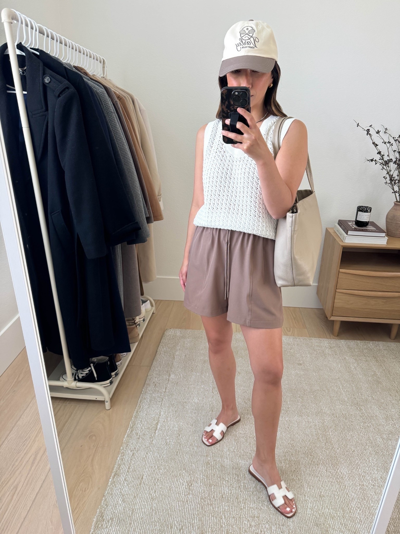 Varley sets are truly the best. They're great for mom life, for travel, and they're petite-friendly. Truly, this is the mom uniform you NEED. It works for everything and you look put together. 

Ferns Open Knit Tank Small
Esmond Shorts small
Noa Club Hat
Hermes Oran sandals 35
Cuyana tote 
Jcrew earrings
Dorsey James necklace 15"

Summer style, summer outfits, petite style, spring style, spring outfits 2026, mom style

#LTKActive #LTKPetite #LTKmomlife