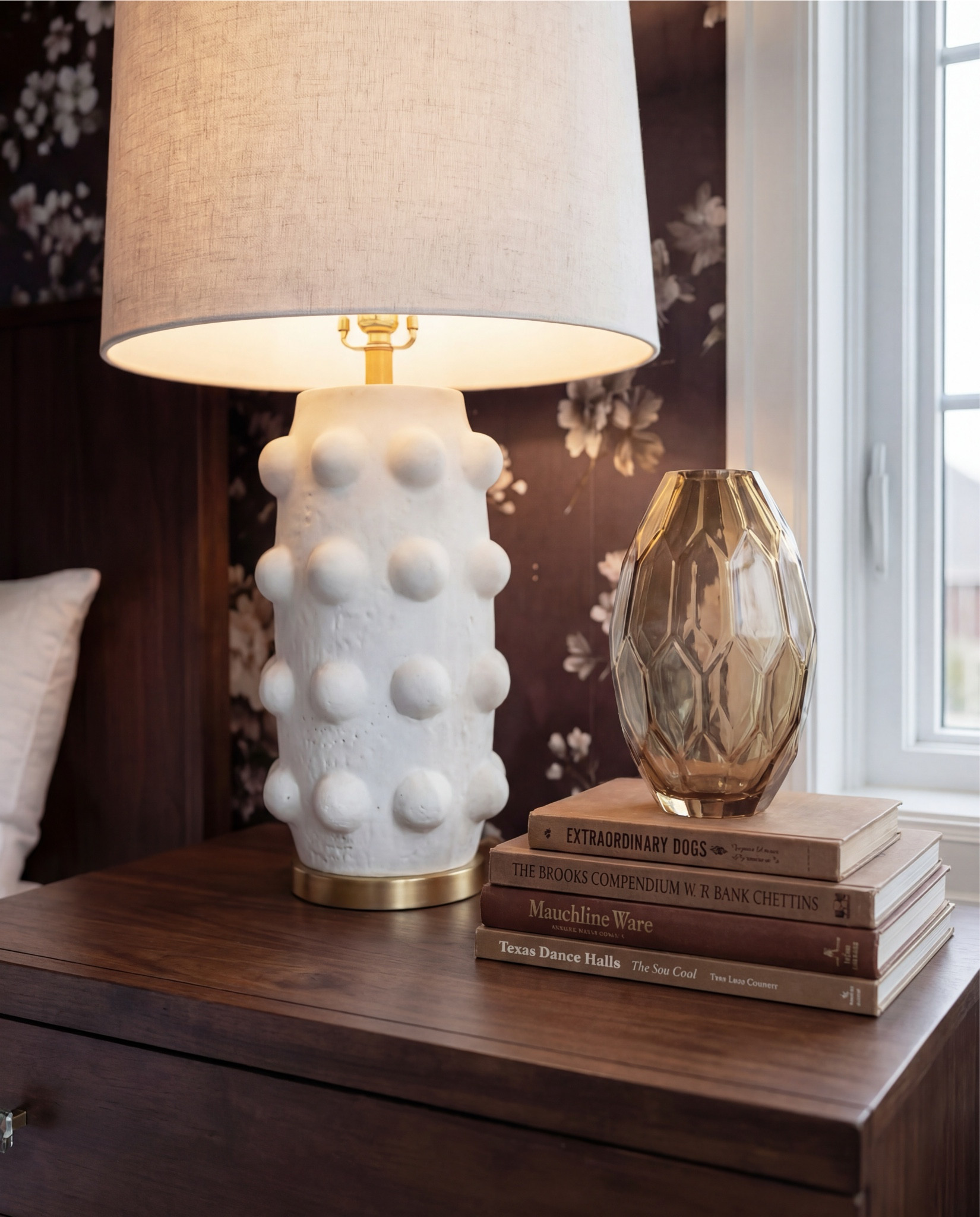 ✨ Shop the Look
Dark wood and brass bed
Sand and taupe throw pillows
Chunky cocoa brown knit throw
Caramel brown ribbed bench
Vintage-inspired terracotta and sage rug
Wood nightstands
Textured white lamps
Moody floral wallpaper
Globe pendant
Glass vase
Decor books

#LTKHome #LTKSaleAlert #LTKFindsUnder100