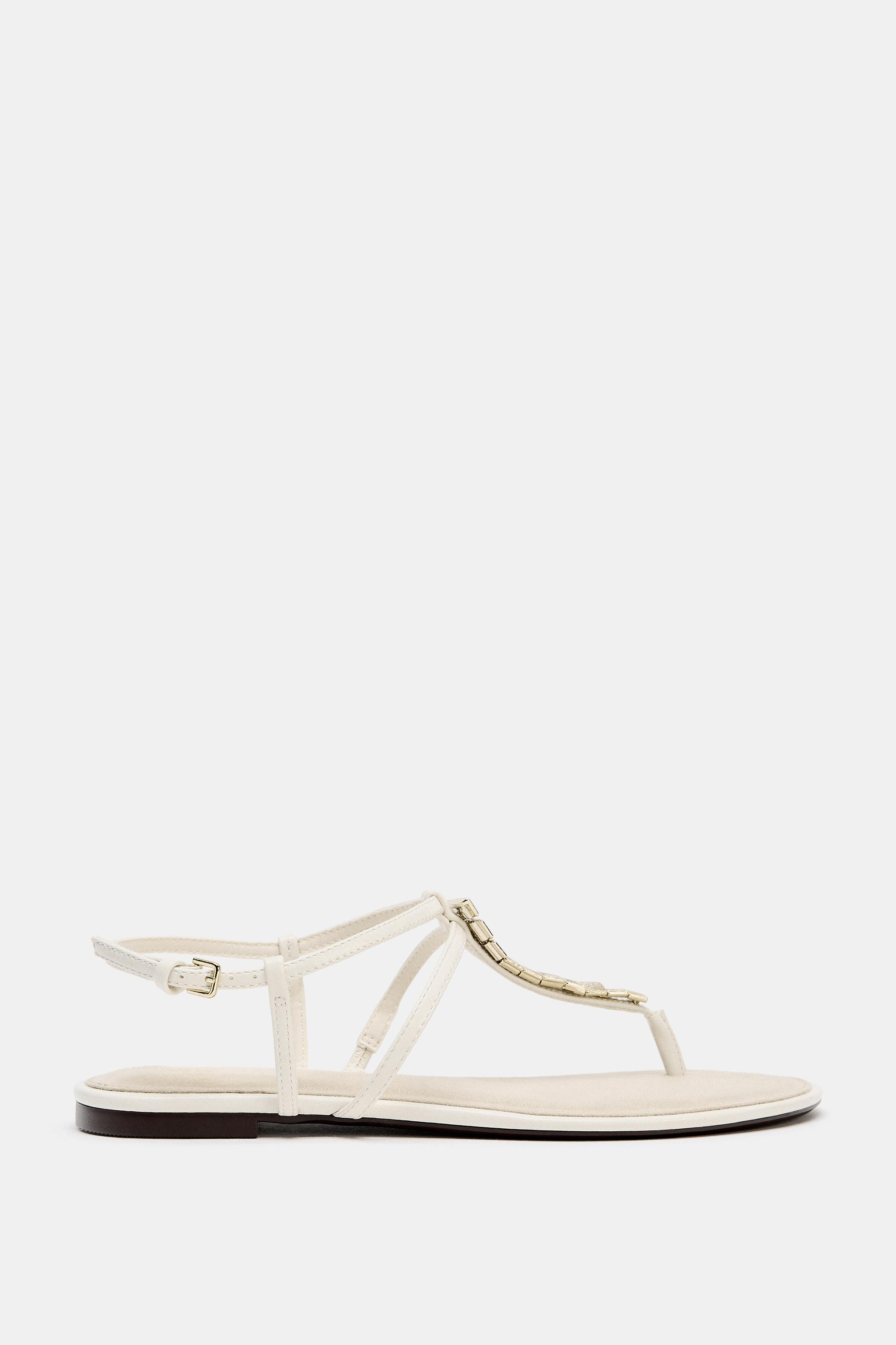 FLAT SANDALS WITH METALLIC APPLIQUES | Zara US
