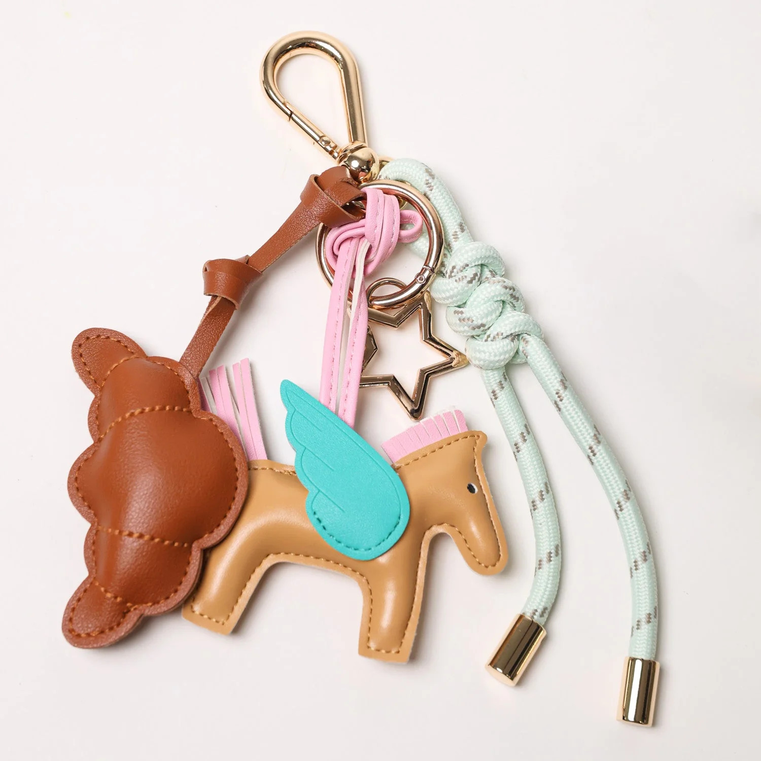 KEY CHAIN MINTY GREEN WITH CHARMS - BROWN CROISSANT AND BEIGE FLYING H | PopUps