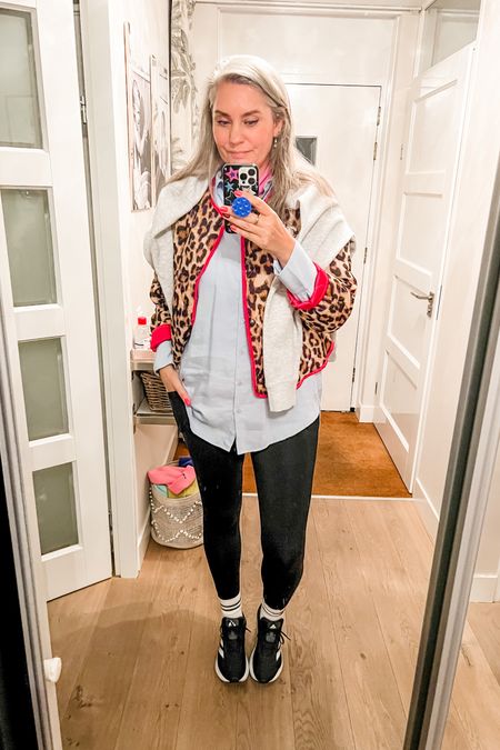 Ootd - Friday. Travel day. Tall leggings with pockets, crew socks, black Adidas sneakers, chambray shirt (Je m’appelle), oversized grey sweater and leopard coat (local boutique). 

#LTKeurope #LTKover40 #LTKtravel
