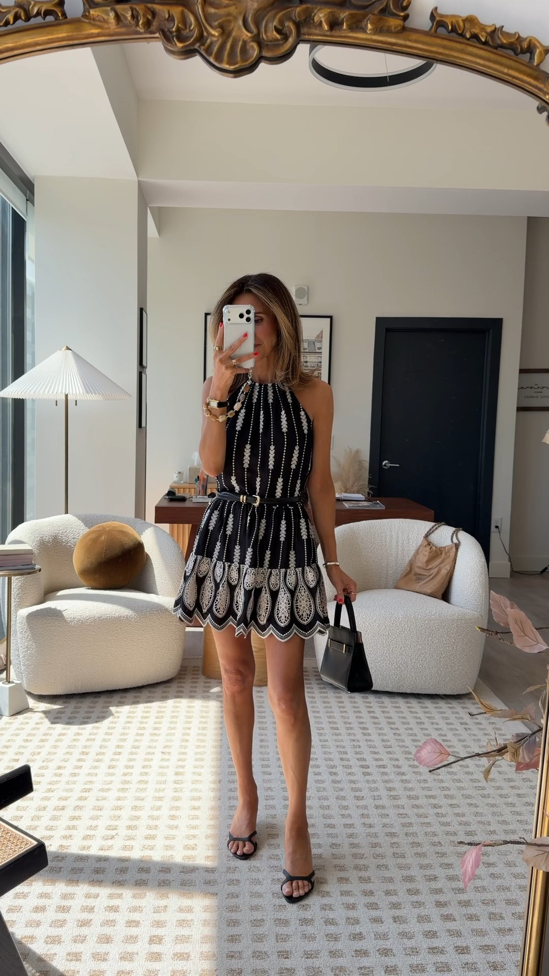 This halter top mini dress is the perfect day to night dress! The scalloped hem and crochet panels give so much character and great for layering! 

#LTKOver40 #LTKSeasonal #LTKootd