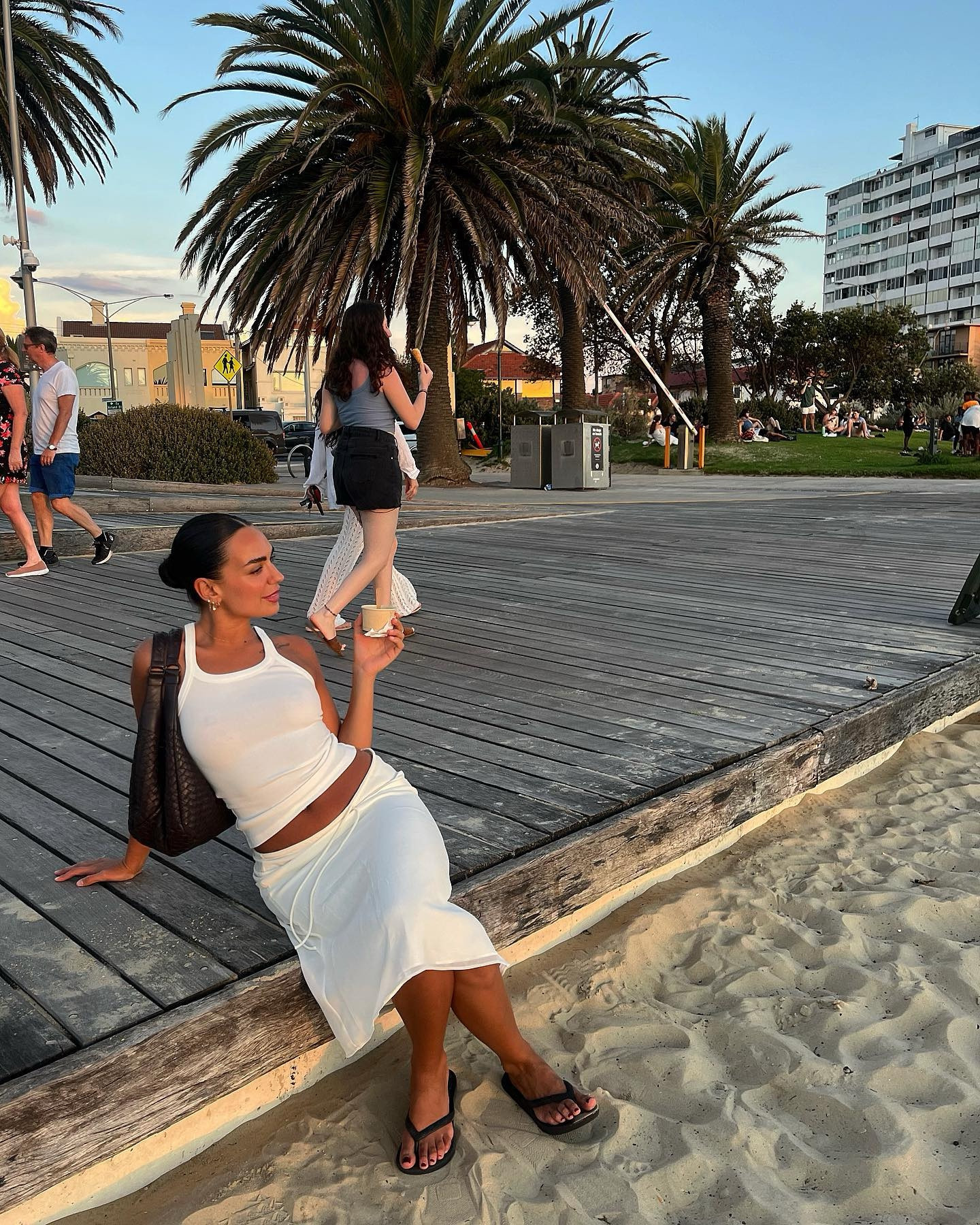 I love an all white monochromatic outfit in summer, makes me feel so tan and put together. This midi skirt is from Princess Polly and this tank is from Henne! My bag is vintage Bottega, and my thongs are Archies 🤍

#LTKstyletip #LTKbeauty #LTKsummer