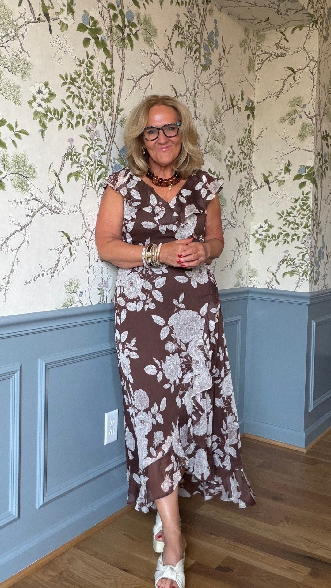 Oh, this is a lovely dress for those occasions when you want to look a little dressed up without overdoing it! The soft floral print and flowing hem are so pretty, and it runs true to size.