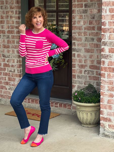 Stripes are everywhere this season and I love this striped sweater! Pair it with a patch pocket! Wear alone or layer with a button down underneath.

Wearing raw hem straight leg jeans and pink & orange cap to ballet flats.

#LTKfindsunder100 #LTKSeasonal #LTKstyletip