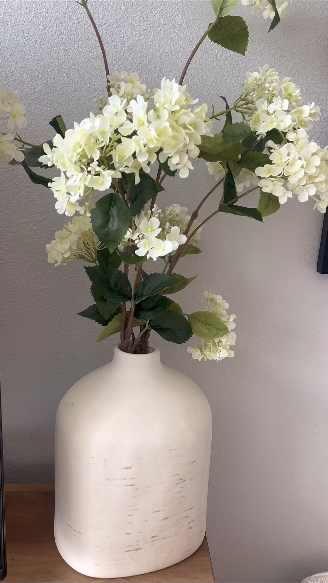 A simple hydrangea arrangement like this is one of my favorite ways to add a soft touch to a space. I linked some very similar stems and a vase with the same look.

#LTKSeasonal #LTKHome