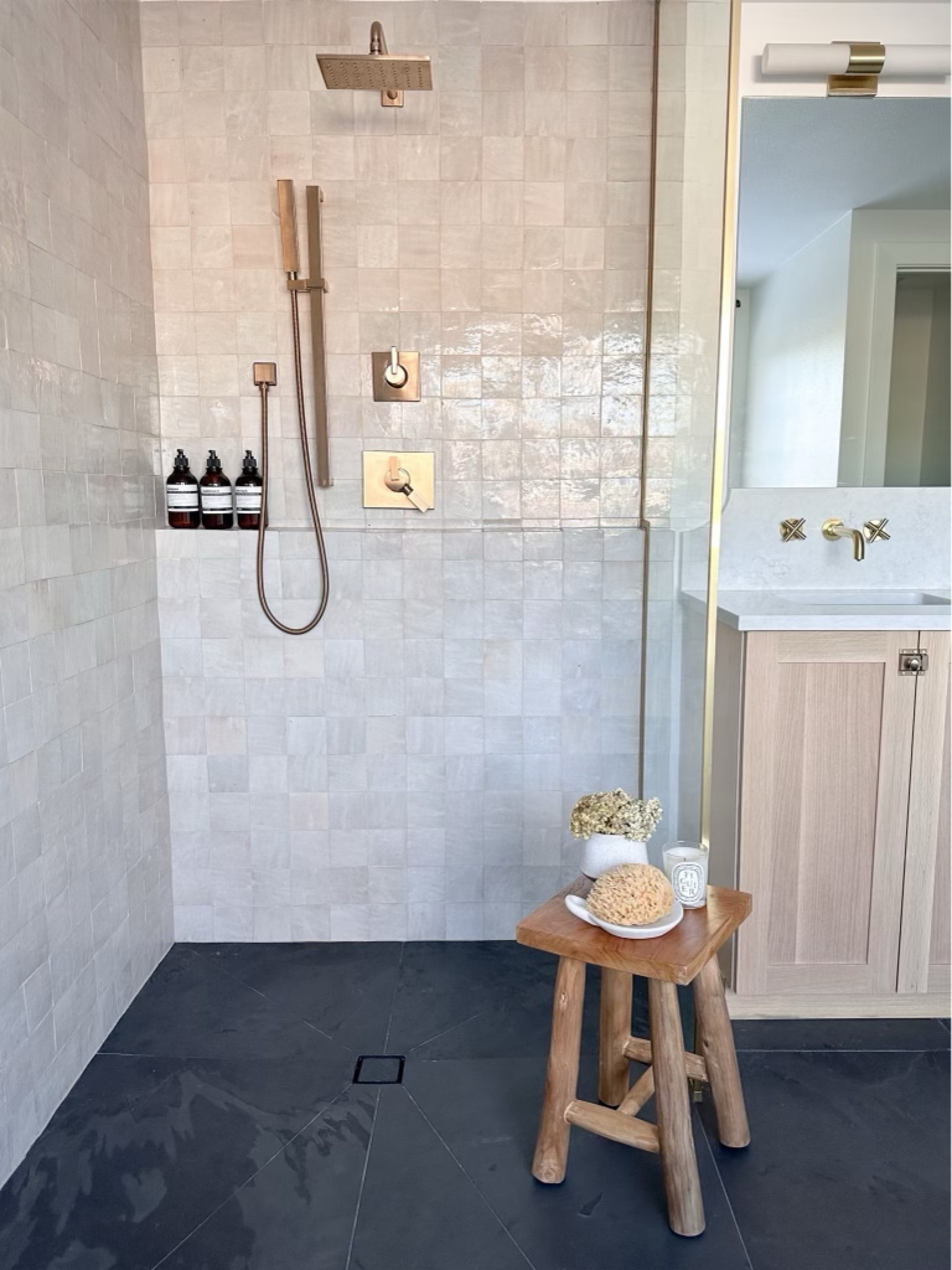 Loving the tiling and golden accents in the bathroom ! The open shower is a must! 

Open shower/ New Bathroom/ Bathroom decor

#LTKhome #LTKsalealert #LTKstyletip