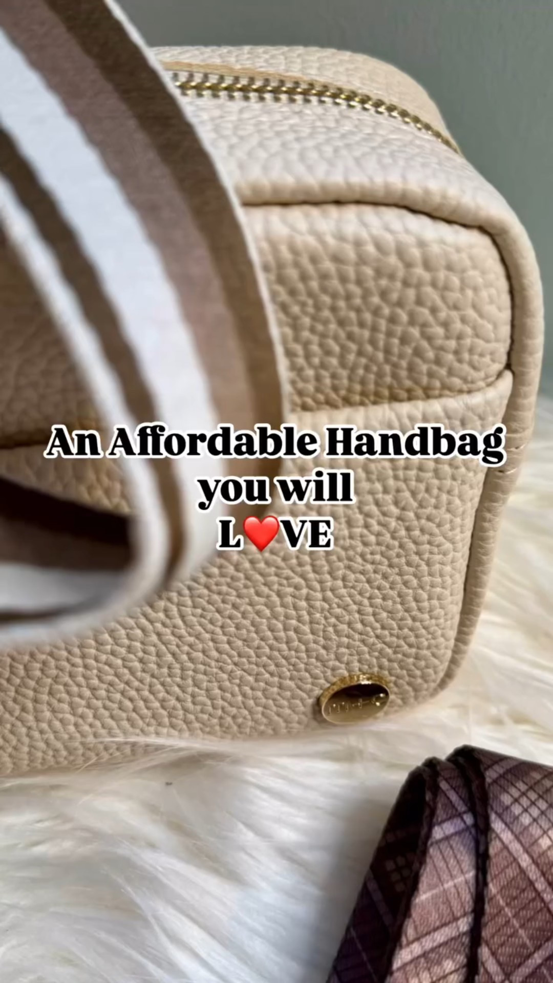 ✨ Affordable Luxury Handbags You’ll LOVE! ✨

Read to the bottom for a coupon!

If you haven’t been watching my handbag series, this is your sign to catch up now! 📣 

I’ve been sharing quality, affordable handbags that look and feel luxe without the designer price tag. Today’s gem? An amazing cream, pebbled leather camera bag that’s classic, chic, and perfect for everyday style. 🤍✨

Missed the previous bags? Go back and watch them all! From structured top handles to suede finishes and sleek crossbodies, I’ve found the best luxury look for less handbags for every occasion. 💼👛👜

✨ Which bag has been your favorite so far? Drop a comment below! 👇

🎯 Save this post for handbag inspo, share it with a friend who loves a designer look for less, and tap the link in my bio to shop all these finds through my LTK storefront!

Use my coupon code: ATALLDRINK20

💬 Let’s chat: Are you team structured bag or slouchy bag? Comment below! ⬇️

📌 Follow @atalldrinkofstyle for more timeless, classic, everyday style for women over 40.
 #AffordableLuxury 
#LuxuryLookForLess 
#ClassicHandbags 
#TimelessStyle 
#HandbagInspo
#AffordableHandbags 
#ClassicStyleOver40 
#ChicAndAffordable

#LTKStyleTip #LTKFindsUnder100 #LTKItBag