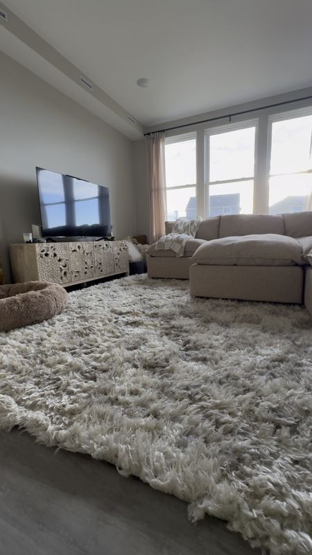 Cozy rug on major sale! I love that while it has a checkerboard pattern, you can’t tell with all the plush/shag to it. 

#LTKsalealert #LTKVideo #LTKhome