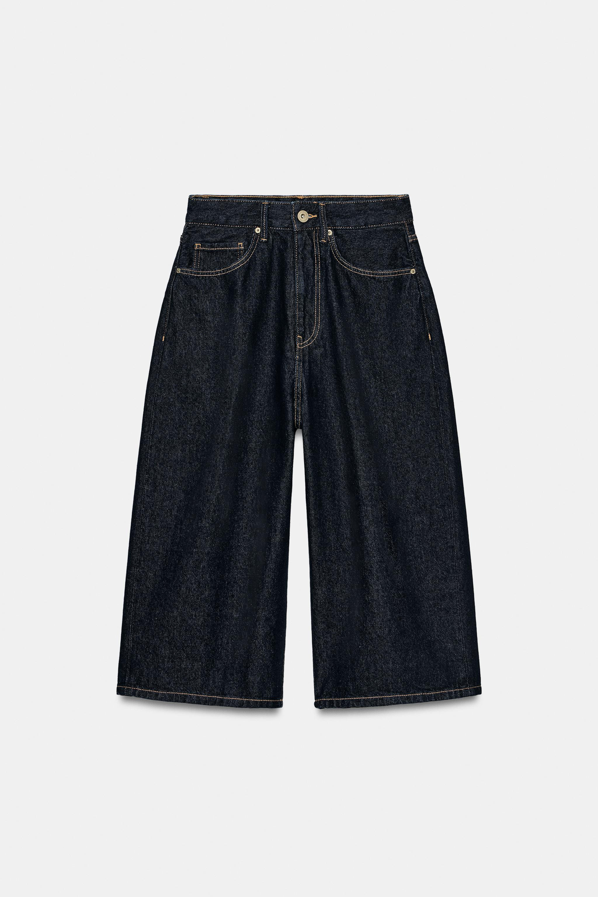 MID RISE - BAGGY - RIPPED. Mid-rise shorts with belt loops and five-pocket styling. Front metal z... | Zara US