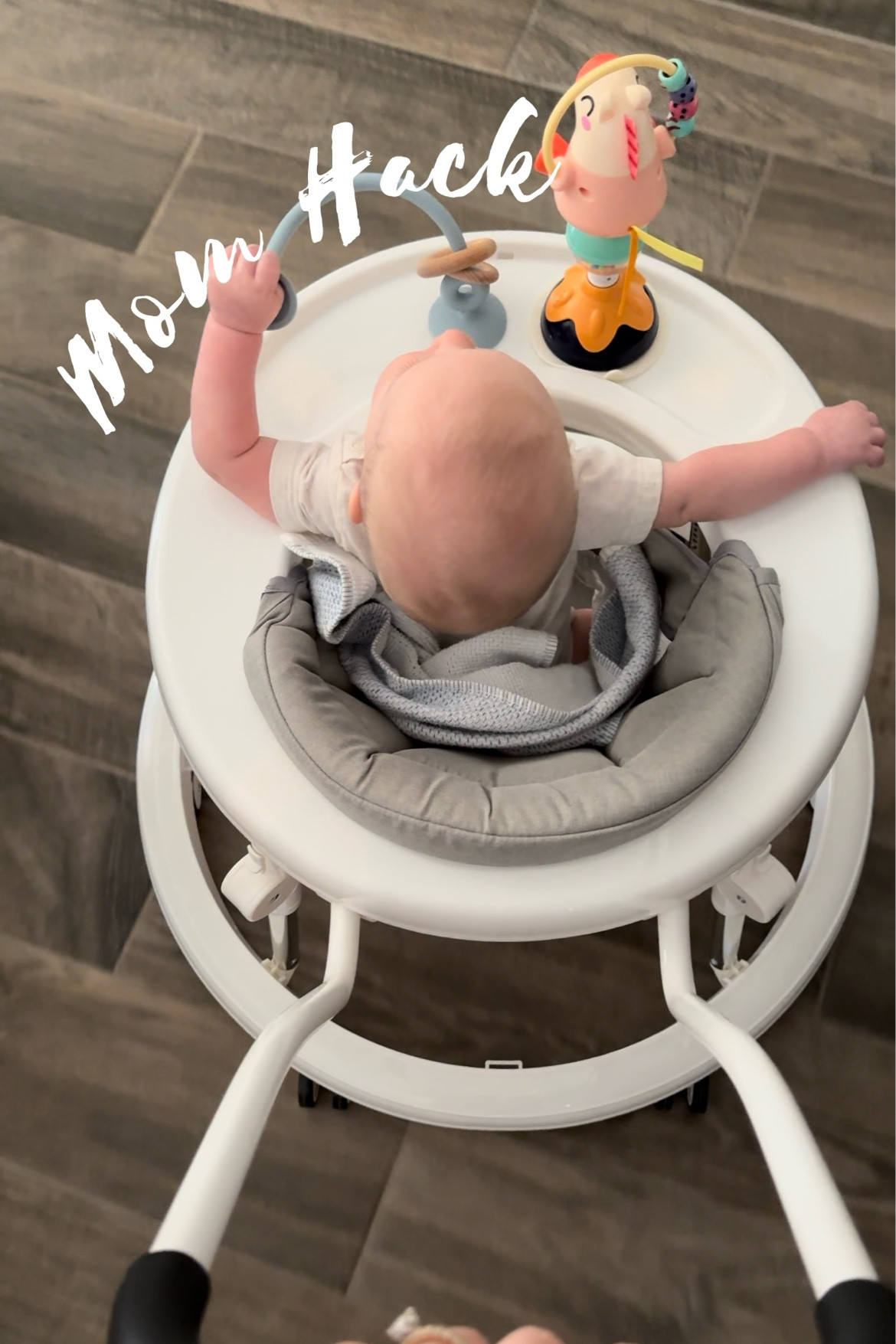 We absolute LOVE this baby walker! Comes with a short and long handle and can collapse easily for travel!
