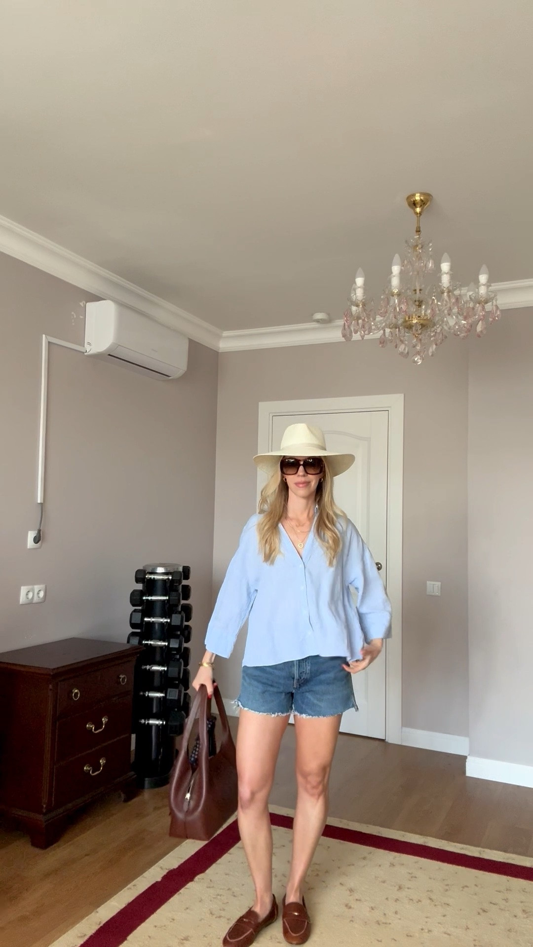 Casual summer outfit with oversized linen shirt, denim cutoff shorts, @Zara leather loafers, Le Tanneur handbag

#LTKSeasonal #LTKOver40 #LTKgrwm
