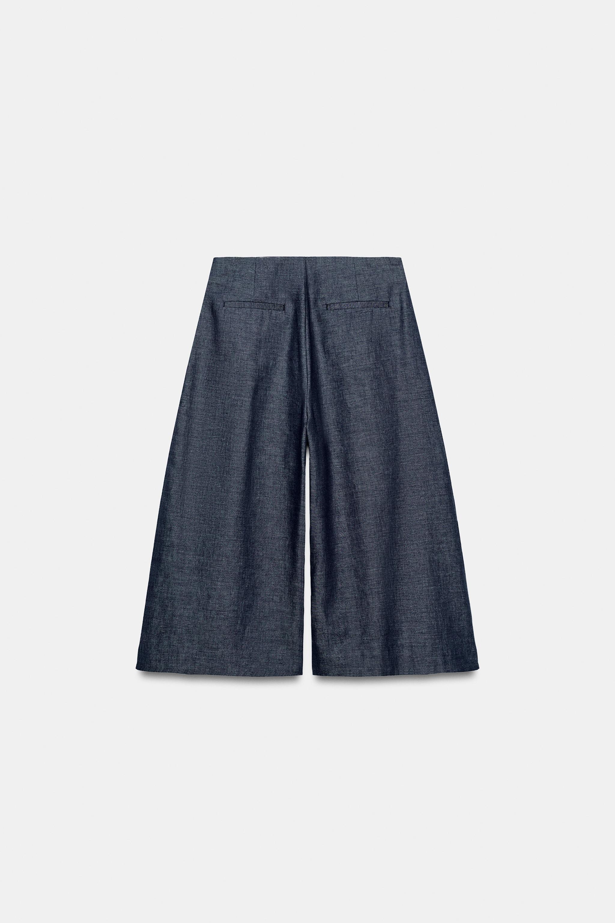 High-waisted Bermuda shorts crafted from linen. Features decorative front buttons and front pleat... | Zara US