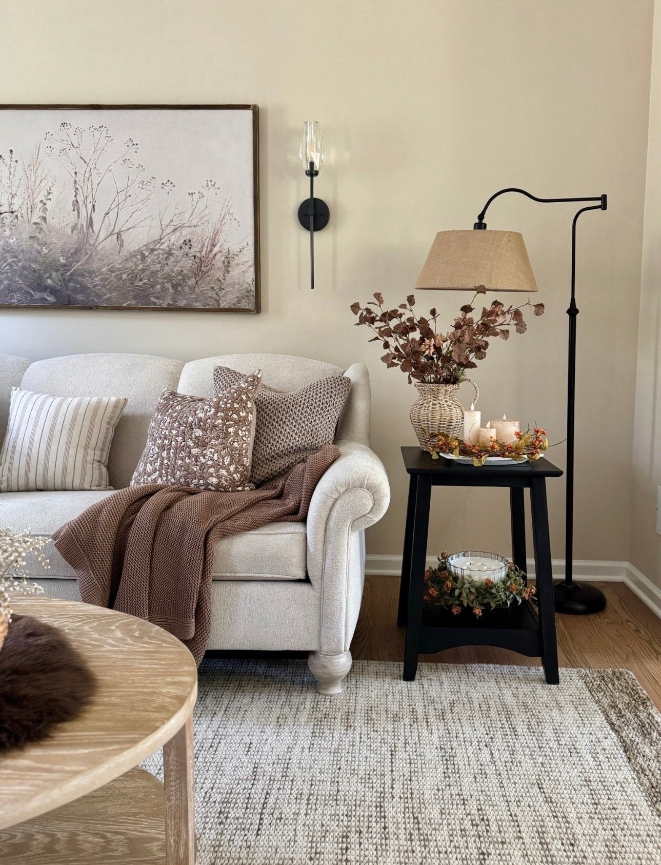 Exciting post! This pretty viral woven vase is back in stock at the most reasonable price! I’m finally able to link my area rug. This is such a beautiful and thick hand loomed neutral area rug in …def one of my favorites. These solid wood end tables are currently on sale. They come unfinished so you can stain or paint them any color you like. Also sharing my curved arm floor lamp that just recently came back in stock. Pretty botanical solid wood framed wall art, crystal wall sconces, faux fur rug used as table runner, pillow covers and the best throw pillow inserts. Very chop-able! 

#LTKFindsUnder50 #LTKHome #LTKSaleAlert