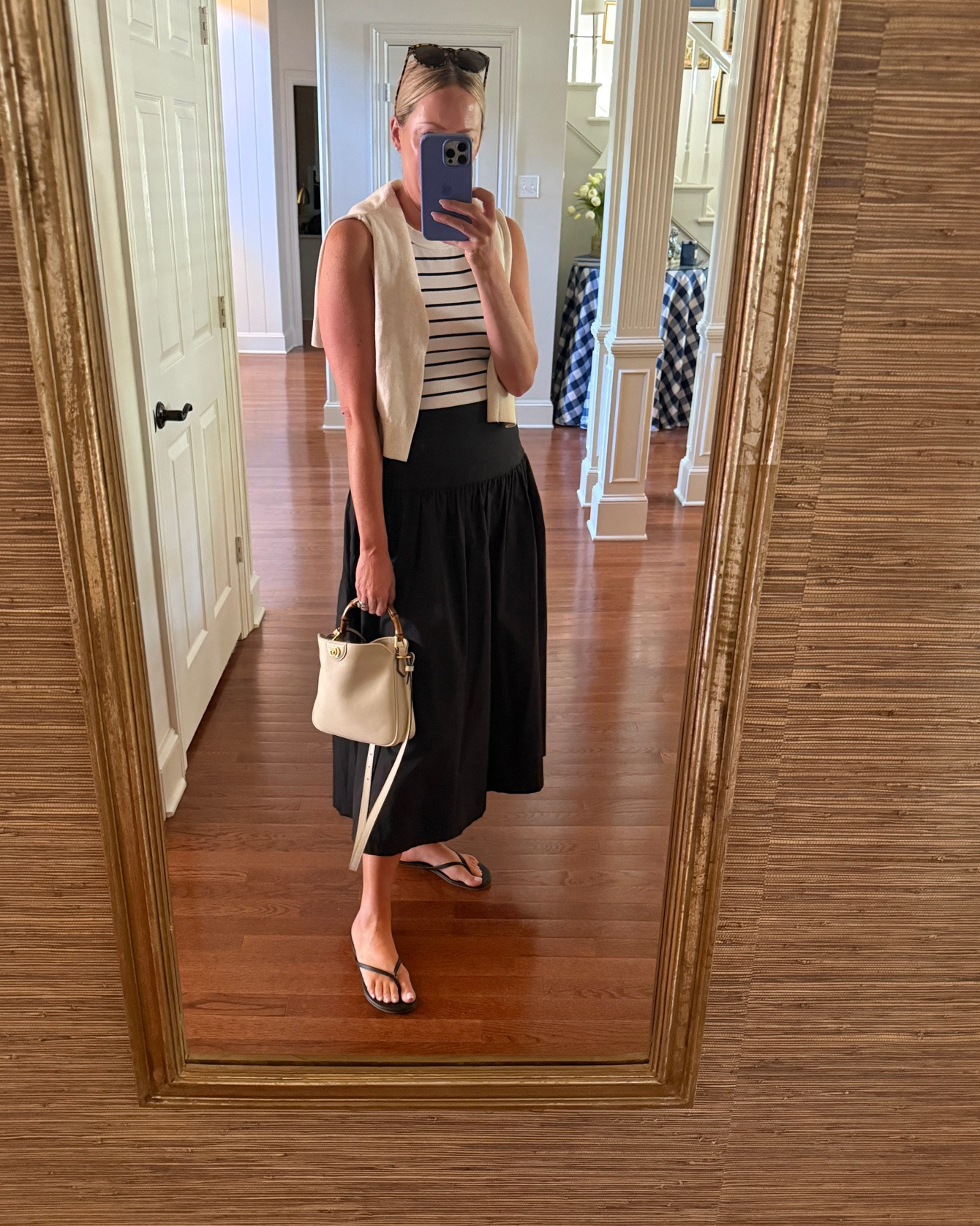 Tank top and flip flops but make it chic for a dinner out!

The right bag and a sweater over the shoulders elevates any outfit, shop my go-to’s here and my black poplin skirt (size down). Oh, and these super cushy flip flops I found on Amazon!❤️

#LTKootd #LTKOver40