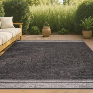 Alda Modern Minimalist Mingled Solid Black/Cream 5 ft. x 8 ft. Indoor/Outdoor Area Rug | The Home Depot