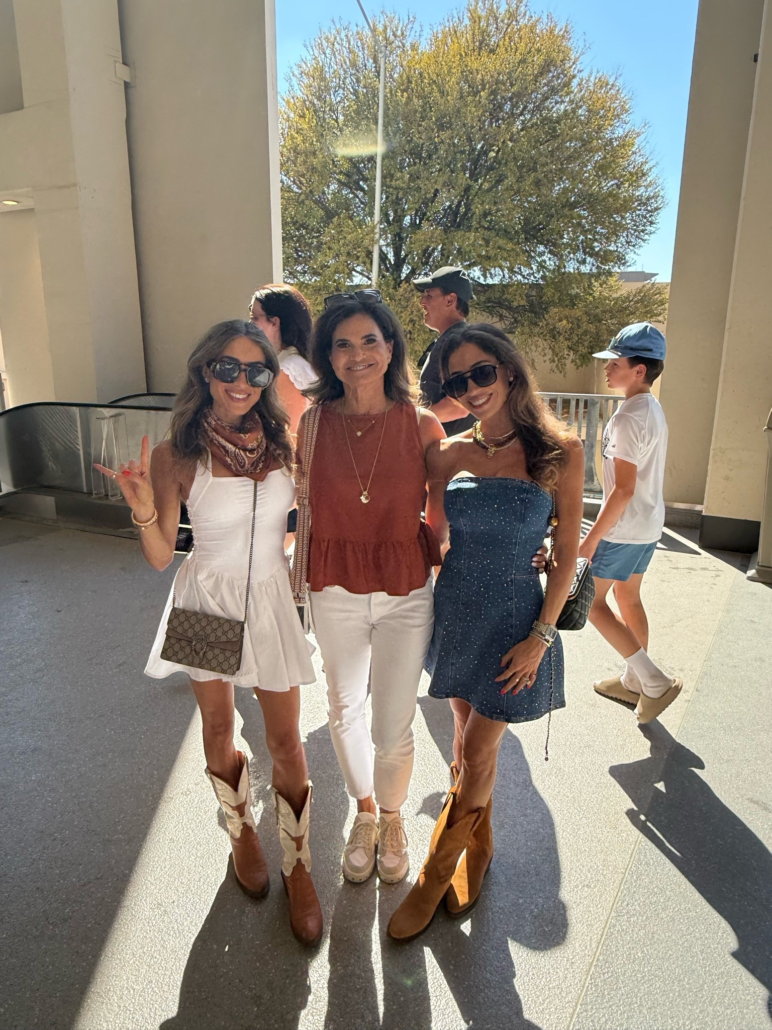 Our Texas gameday outfits for all ages! Wearing smallest size in dresses and my mom’s top is Amazon!
