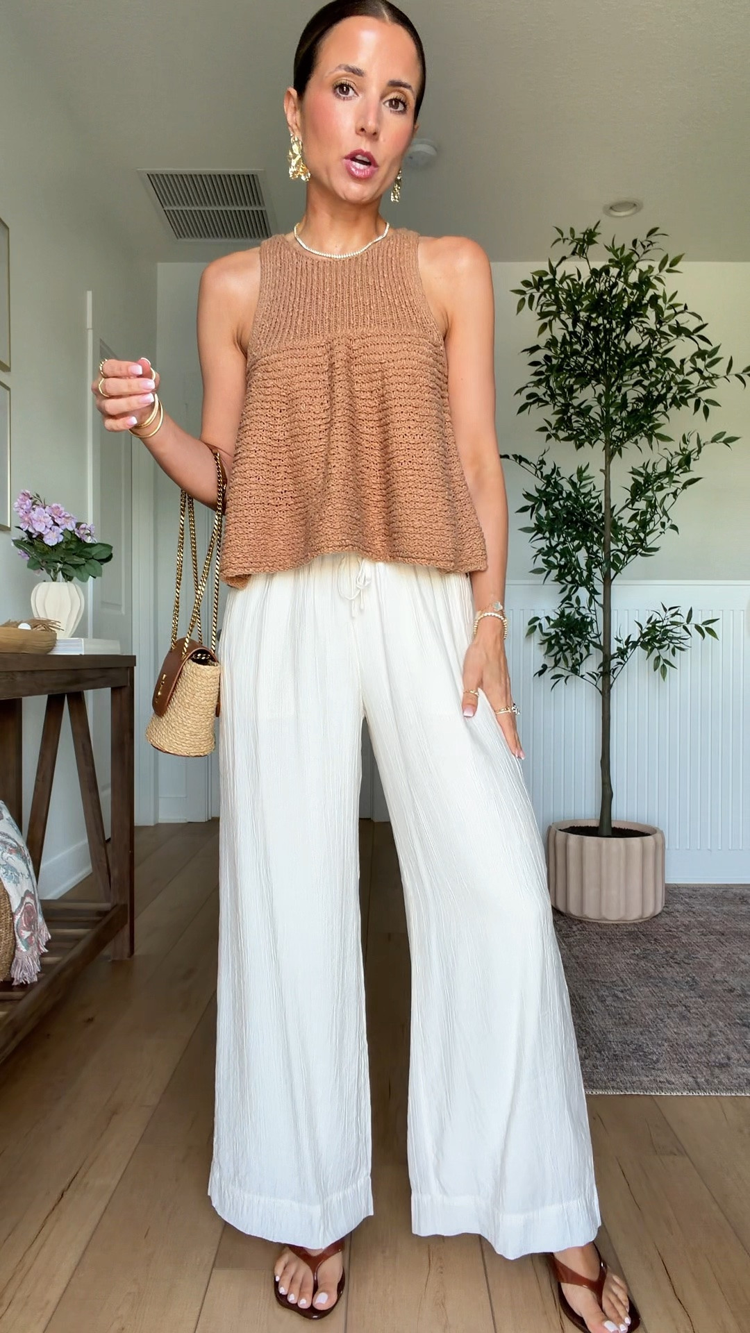 My dinner outfit. Summer outfit. Elevated casual outfit. Resort outfit. Resort wear. Vacation outfit. Europe outfit. New wide leg crinkle pants from Abercrombie in XXS short. Anthropologie sweater tank in XXS. Amazon jelly sandals are TTS. YSL raffia bag.

#LTKootd #LTKTravel #LTKPetite