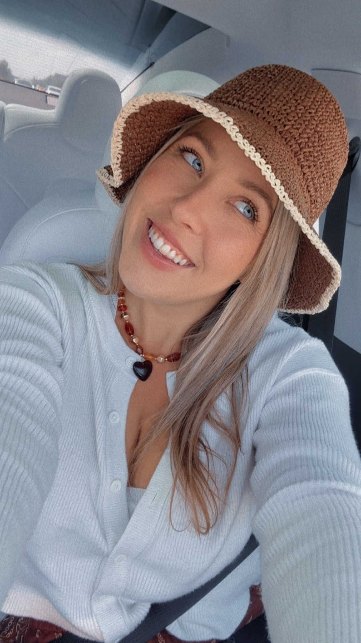 Brown straw hat
Brown necklace
White cardigan sweater
Summer hat
Straw crochet bucket hat

#LTKTravel #LTKU #LTKootd