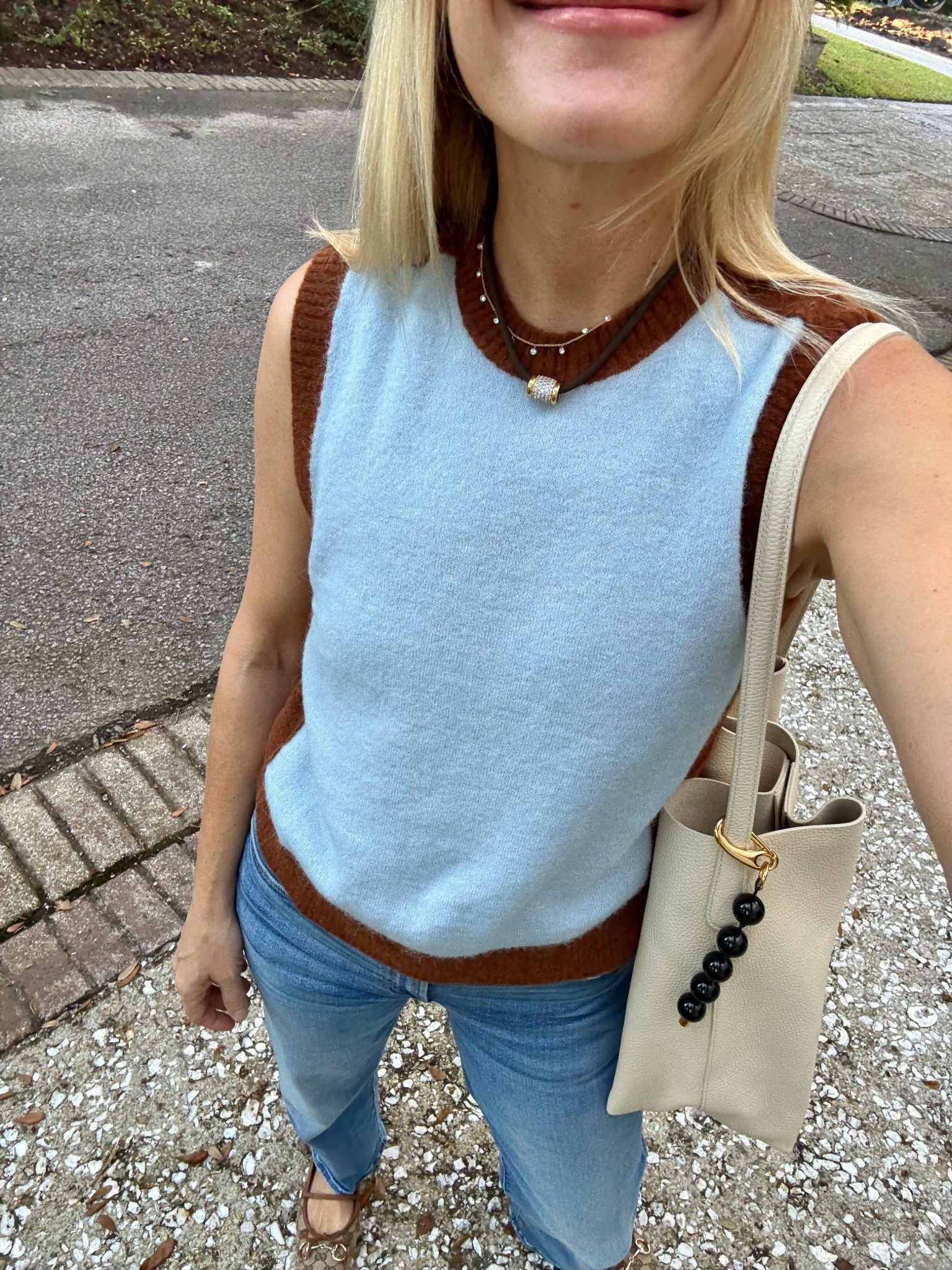 Sleeveless sweater vest. The perfect every day jeans and cute fall flats!

#LTKShoeCrush #LTKItBag #LTKSeasonal