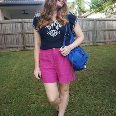 Navy and pink, tucking this embroidered tunic into my thrifted fuchsia pink Kmart linen shorts. Wore my Rebecca Minkoff Julian nylon backpack for another themepark day out. 💕💙

#LTKaustralia