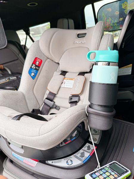 Found a cup holder extender that fits in the Nuna Rava, Revv & Exec ! Literally will hold ANY cup in place now! I also added another cup hold for the Nuna car seats & a snack tray ! 

#LTKTravel #LTKBaby #LTKBump