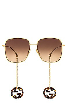 Gucci Chain Logo in Gold & Brown from Revolve.com | Revolve Clothing (Global)