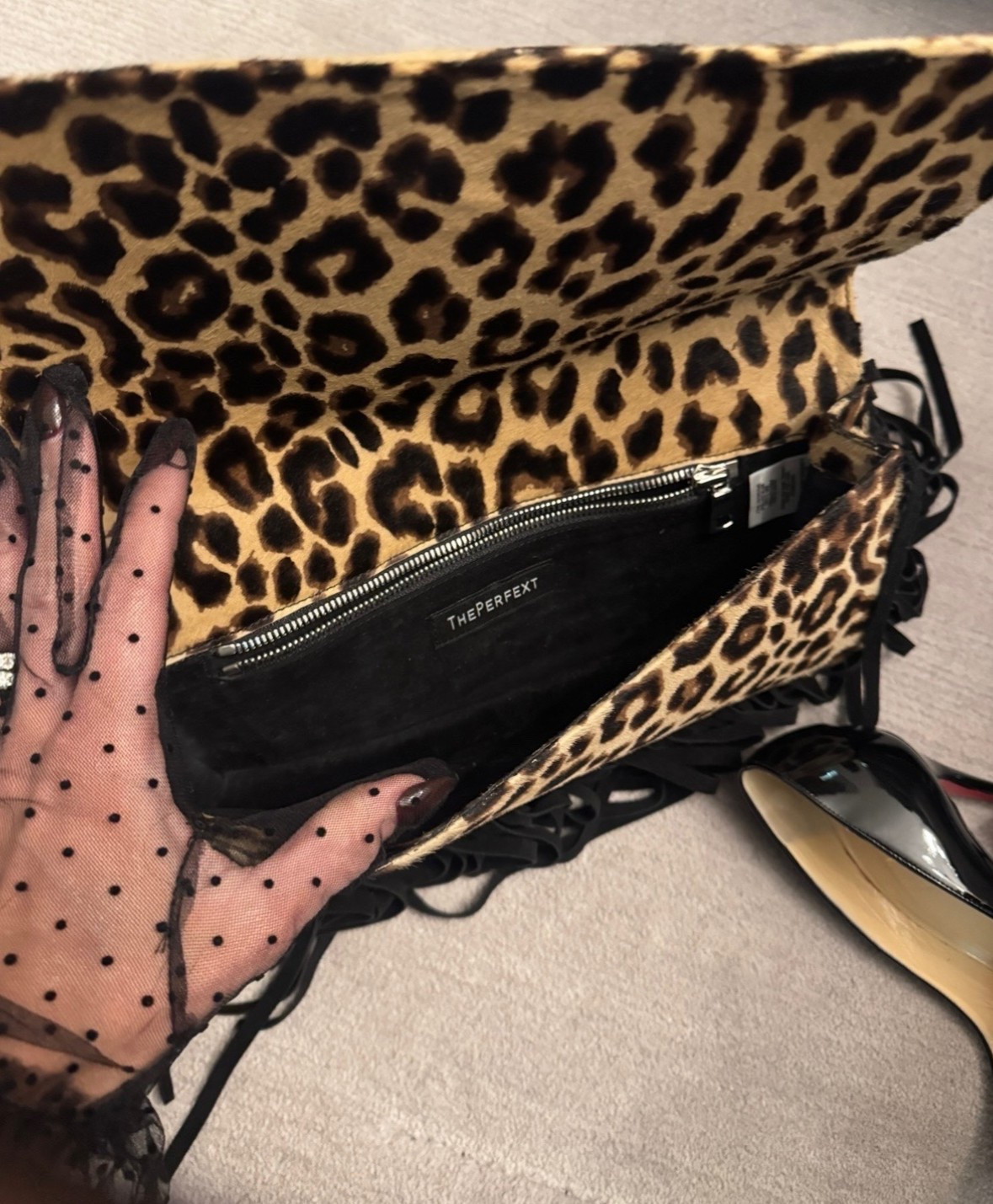 The details make the perfect look 💋 My leopard print fringe bag is by ThePerfext,  I found the exact bag available on eBay for you! My patent black stilettos are Christian Louboutin, and sunglasses are Tom Ford. My sheer polka dot gloves by Sierra Darien are a fun glamorous touch. Happy New Year! ✨

#LTKFindsUnder100 #LTKSeasonal #LTKFindsUnder50
