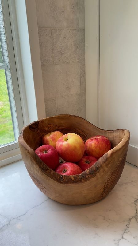 This rustic olive wood bowl from @covehome_ is a statement piece in my kitchen. It’s hand carved and made from 100% sustainable wood. I love the size of it and the detail is just beautiful.

I've linked my olive wood bowl and more in my LTK Shop so you can go shop directly from there! 

#covehome
#organicmodern 
#kitchendecor
#wood
#liketkit
@shopltk

#LTKHome #LTKStyleTip #LTKGiftGuide
