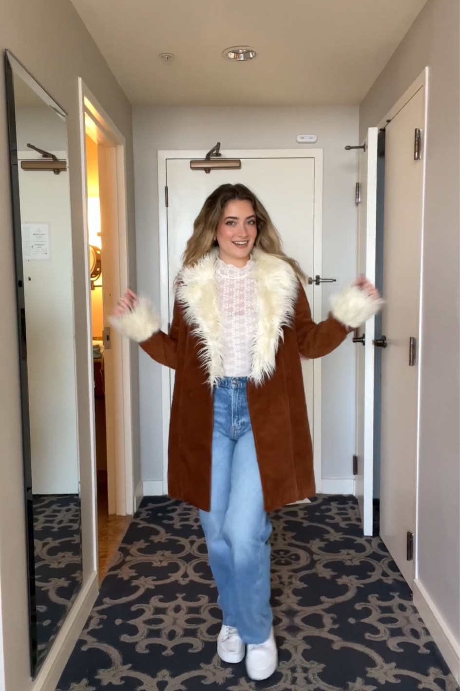 I’m wearing a size small the the coat, size medium in the bodysuits and size 27 in the jeans 