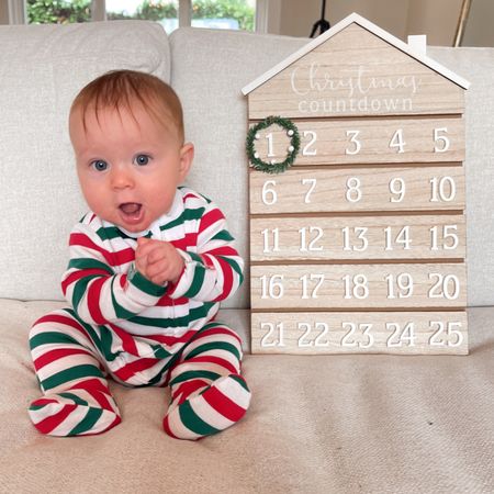 Candy cane striped Christmas pajamas for baby! There are also family matching Christmas pajamas for mom and dad - and everything is on sale! also linking a few of my favorite Christmas countdown calendars. 
- Christmas outfits - baby Christmas - Christmas pjs - family pjs - holiday pajamas 

#LTKfamily #LTKbaby #LTKHoliday