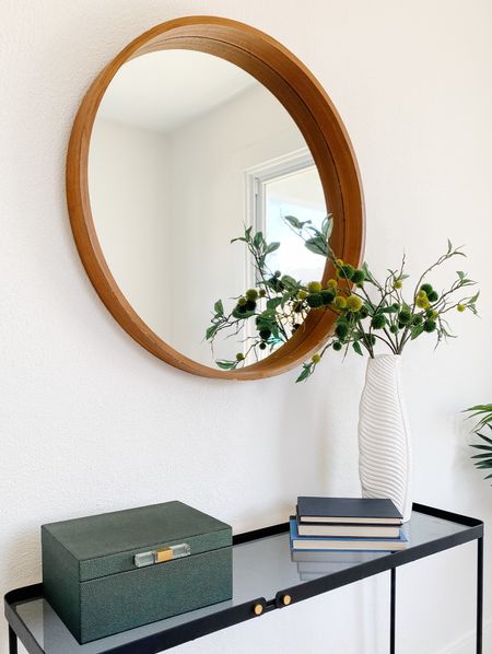 Using accessories with warm earthy tones can help get your space ready for the changing seasons!
.
.
.
Seasonal Decor
Green Decorative Boxes
Gray Decorative Boxes
Faux Greenery 
Round Wood Mirror 
White Ceramic Vase


#LTKstyletip #LTKSeasonal #LTKhome