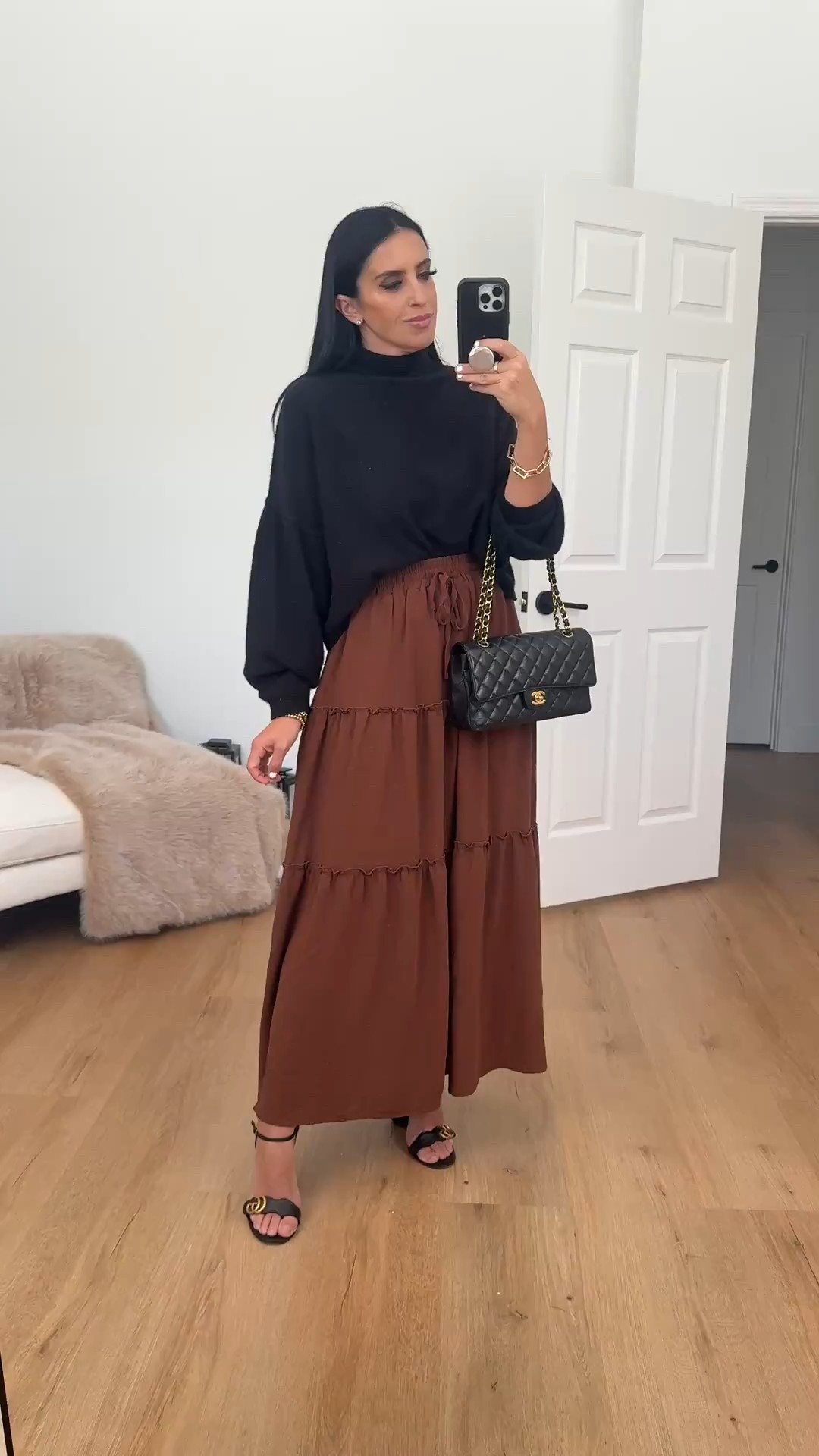 Brown maxi skirt under $30. Black turtleneck sweater. Gucci heels