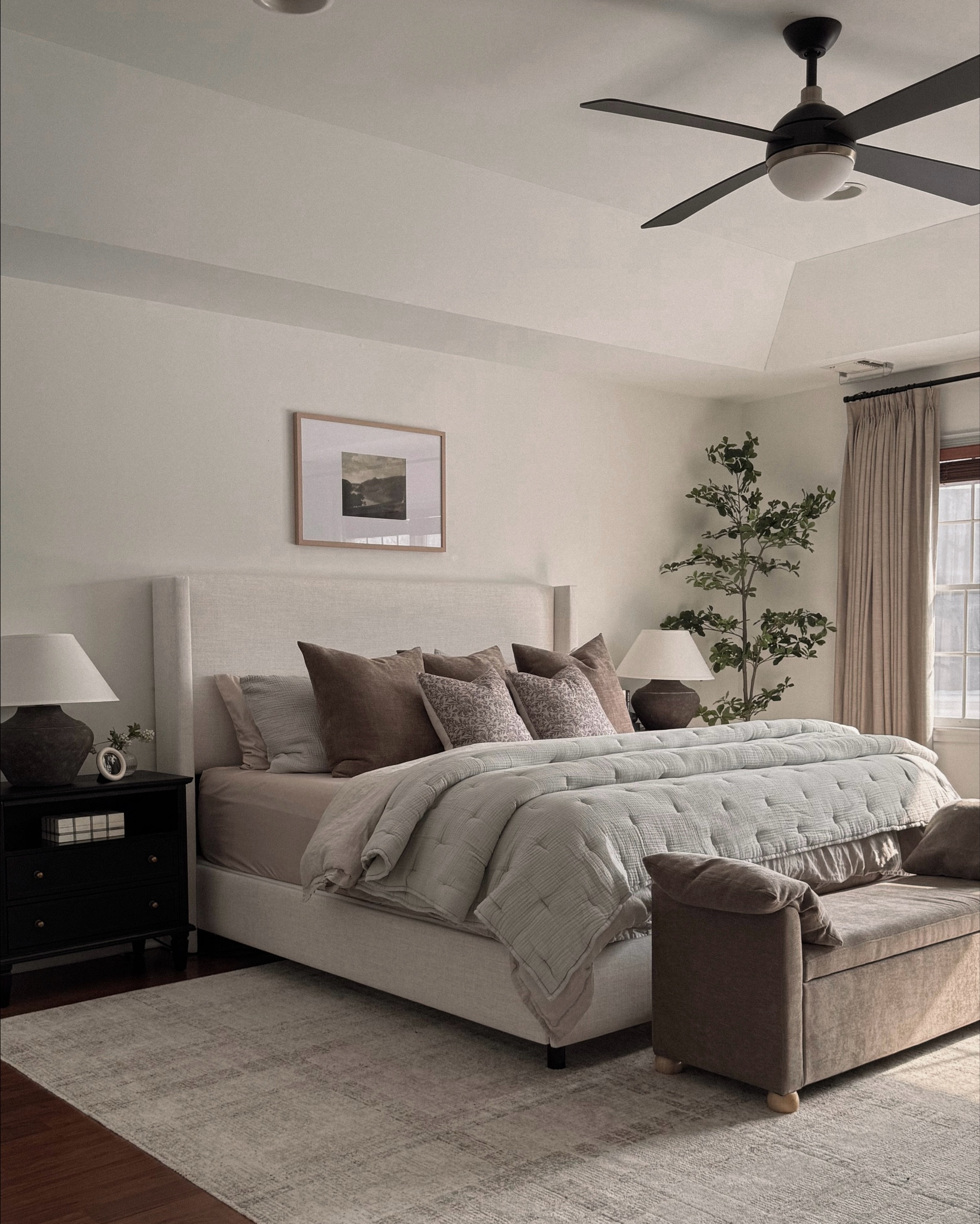 Primary bedroom, spring bedding, quince bedding, Amazon bedding, linen bed frame, upholstered bed frame, bedroom rug, bedroom curtains, olive tree, charging nightstand, nightstand lamp, table lamp 

#LTKHome