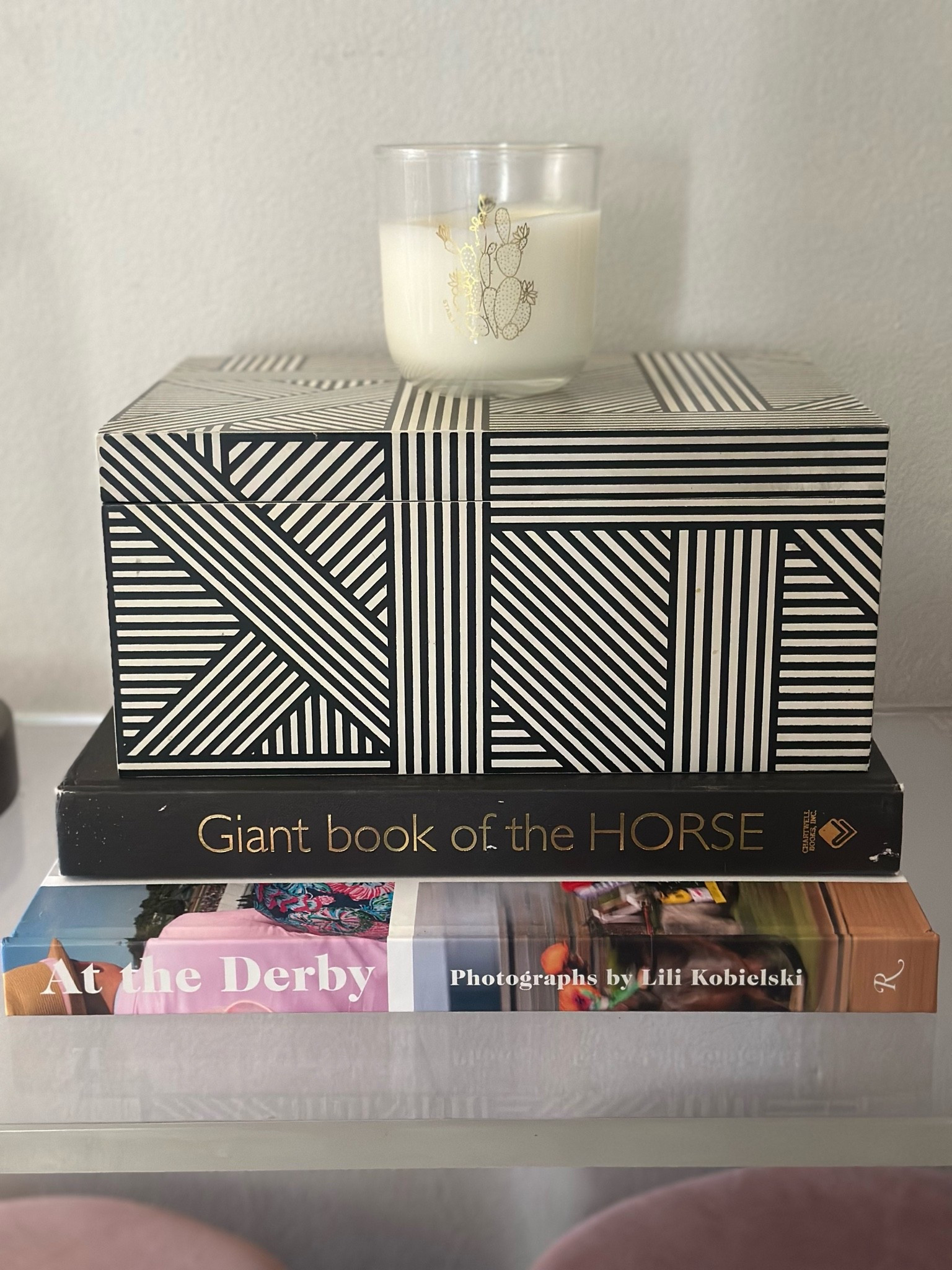 A fresh cactus 🌵 candle and book stack

#LTKHome