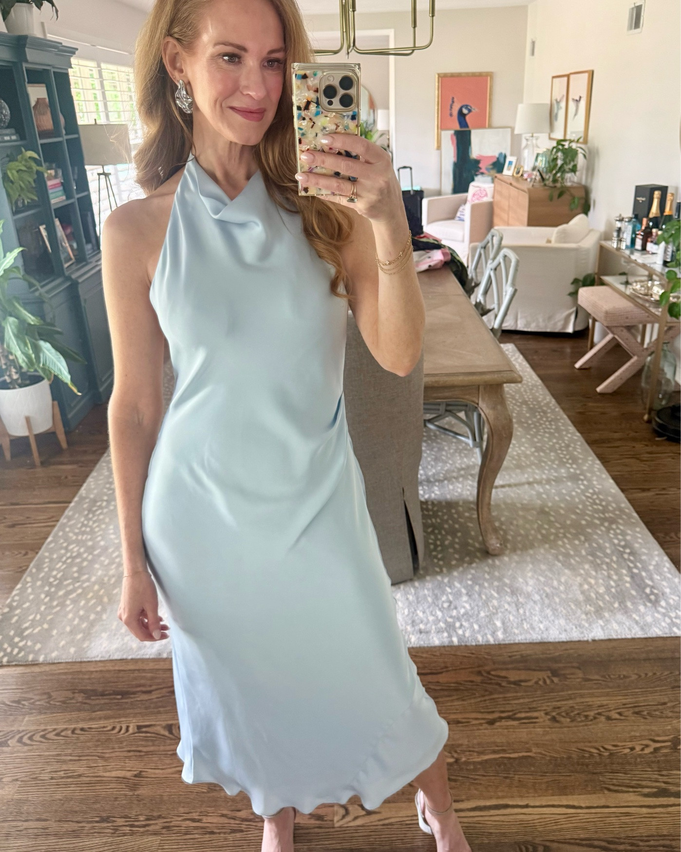 Light blue satin halter dress from @Aritzia is wedding guest dress perfection!! It was so comfortable and a classic silhouette! Im in a size 4. Added simple silver accessories.

#LTKWedding #LTKSeasonal #LTKOver40