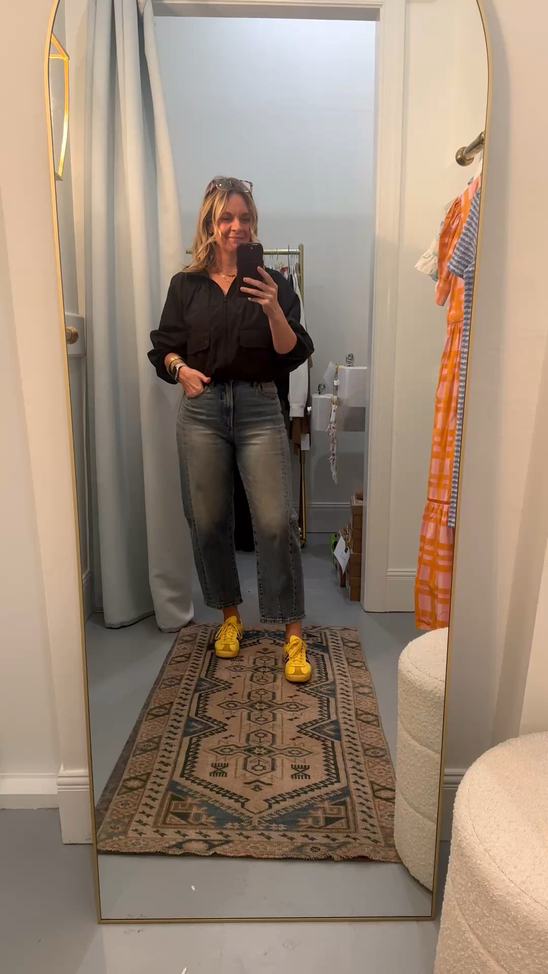 OOTD while setting up a dressing room for a client appointment 🙋‍♀️ Black windbreaker + barrel leg jeans + yellow Adidas — all from my own closet. Linked the exact pieces where I can and the closest versions where I can’t. Everything shoppable below! 👇

#LTKdayinmylife #LTKOver40 #LTKootd