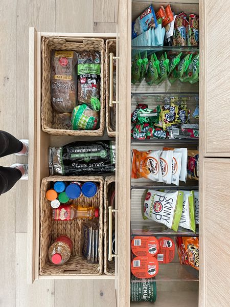 Organized pantry drawers! 

This family has a wall pantry with 2 large drawers on the bottom. I organized the top drawer for the kids snacks and the lower drawer contains bread, popcorn making and more. 

We used simple clear bins and baskets that were measured to fit well!

#LTKfamily #LTKhome