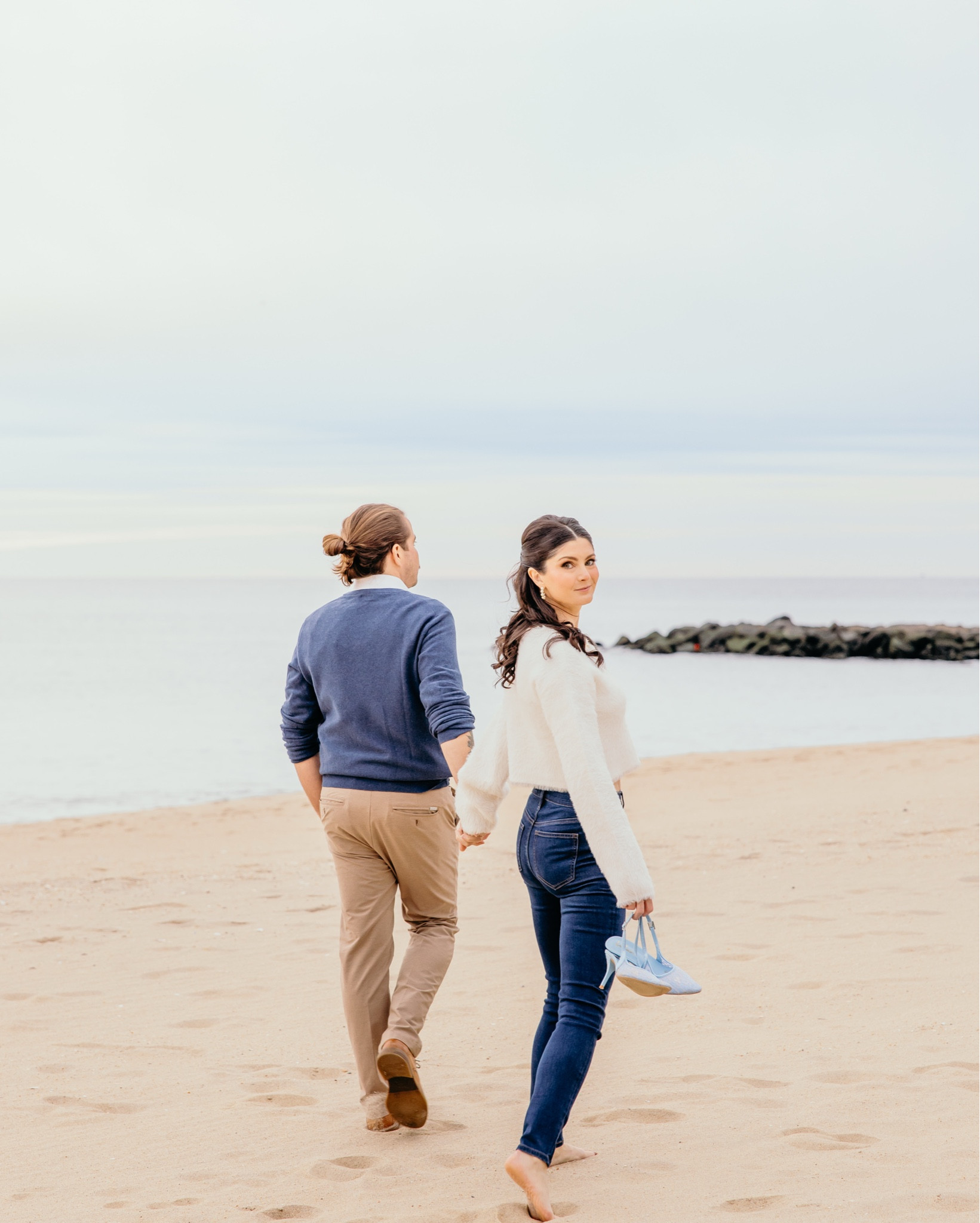 A cozy white sweater for my engagement shoot on the beach. This look would also be perfect for a casual holiday party!

#LTKWedding #LTKSeasonal #LTKFindsUnder50