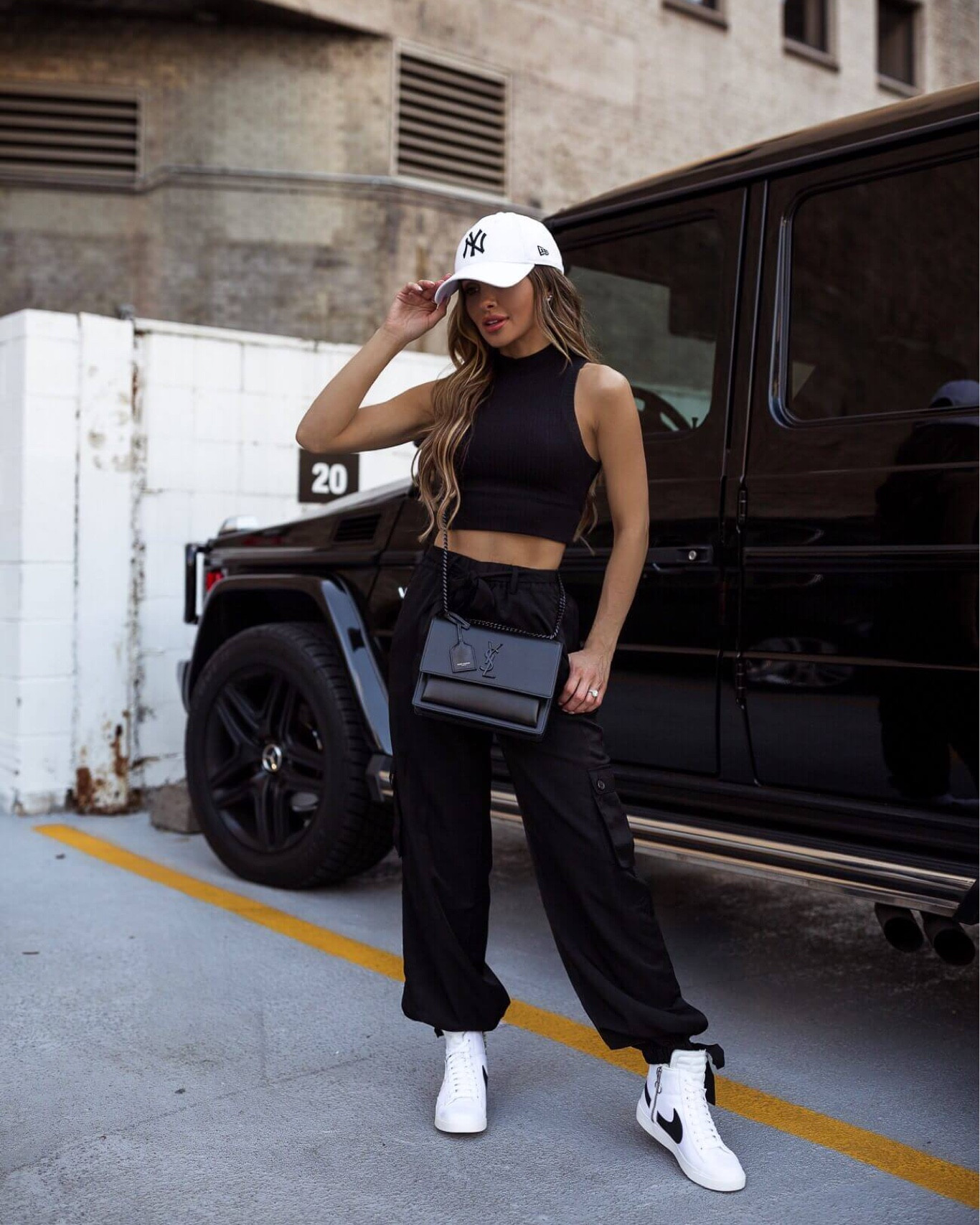 Casual summer outfit / sporty chic style
Black cropped tank top
Revolve joggers
Nike daybreak sneakers
Ny Yankees cap 

#LTKunder100 #LTKshoecrush #LTKstyletip
