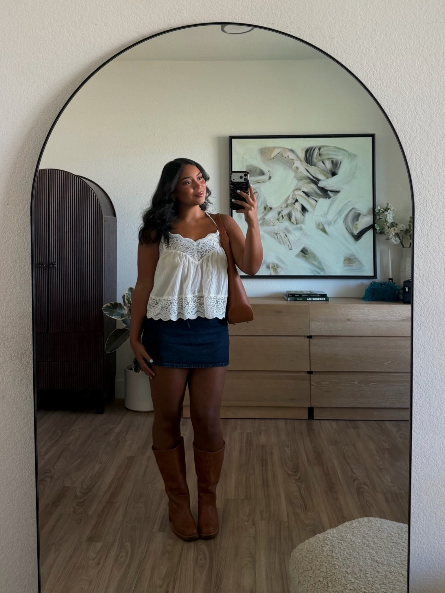 fall transitional outfit🤍 one of my favorite ways to make an outfit feel more fall is by swapping out the shoes! Top is Grey Bandit & denim skort is American Eagle (both run true to size, wearing a L in both) & boots are DSW!

#LTKootd #LTKMidsize #LTKSeasonal