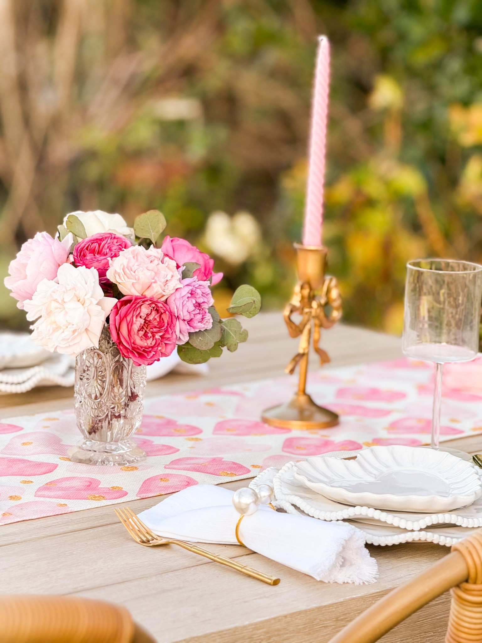Valentine’s Day decor idea. Valentine’s Day tablescape with heart plates, a vintage inspired glass vase with garden roses from our flower farm, a heart table runner, gold bow candleholders and pink candles, 💗❤️ 

#LTKFindsUnder50 #LTKSeasonal #LTKHome