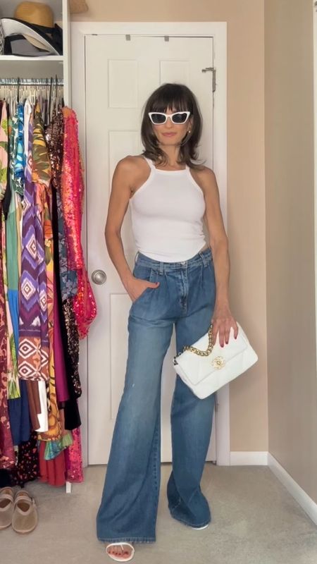Summer casual chic look!

Jeans fit true to size, but I sized up so I could wear it mid waist as well as high waist with a belt. I’m wearing a size 25

Exact sandals are MANGO from last year, so I linked their new version of it and I also bought one for myself 😁

Tank is old, so I linked a similar one

#LTKFindsUnder50 #LTKOver40 #LTKStyleTip