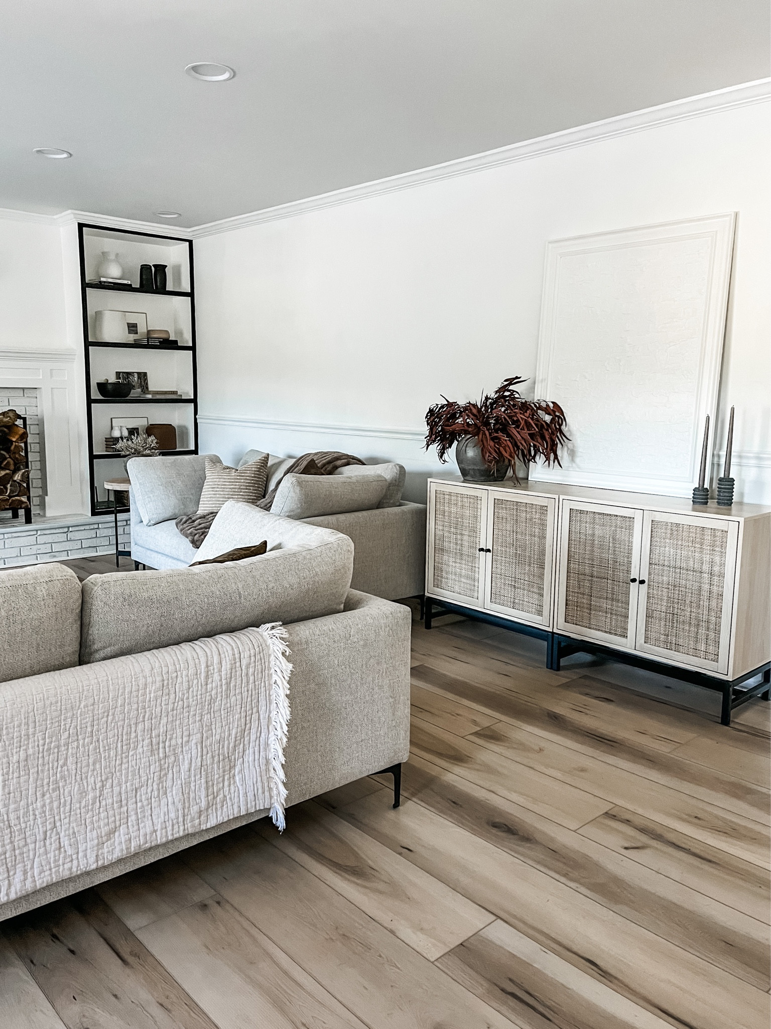 I pushed two rattan cabinets together to make this console! We store our games in it. 

#LTKhome