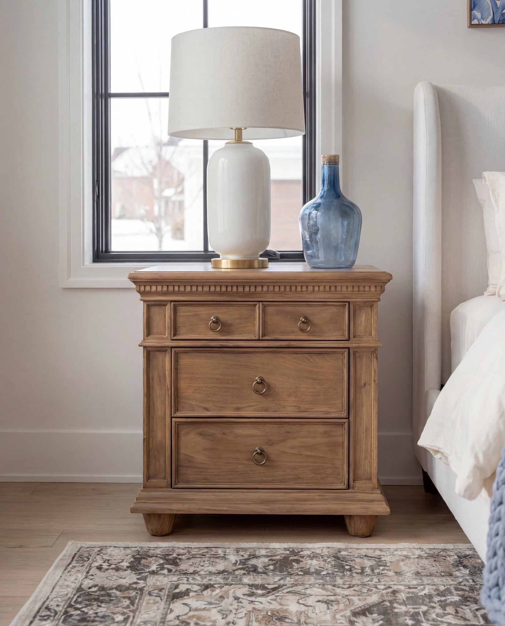 Shop the Look: Bedroom Refresh
• Upholstered bed frame (soft ivory fabric)
• White bedding set (cotton or linen)
• Chunky knit throw blanket (dusty blue)
• Blue and ivory accent pillows
• Wood nightstands (warm oak tone)
• Ceramic table lamps (white with brass detail)
• Blue glass decorative bottles
• Framed blue botanical wall art (set of three)
• Upholstered bench with fluted wood base
• Vintage-style area rug (beige, taupe, muted blue)
•White decor books
•Wood Decor beads 

#LTKSpringSale #LTKSaleAlert #LTKHome