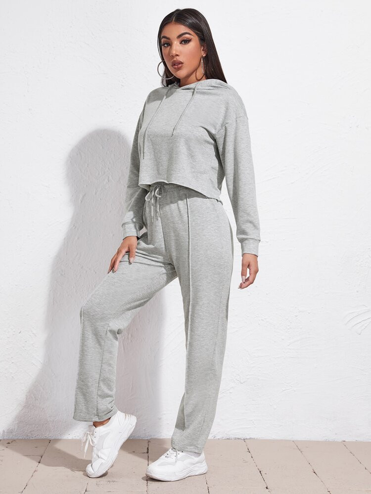 Einfarbiger Kapuzenpullover mit sehr tief angesetzter Schulterpartie & Hose mit Kordelzug um die ... | SHEIN