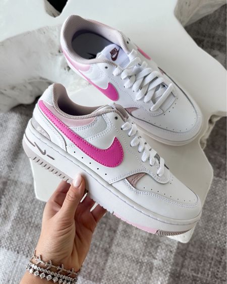 Pink Nike sneakers 

#LTKstyletip #LTKfindsunder50 #LTKshoecrush